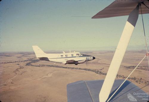Royal Flying Doctor over Cuddpan Station, Diamantina Shire, 1974