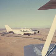Royal Flying Doctor over Cuddpan Station, Diamantina Shire, 1974