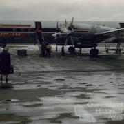 Ansett-ANA Electra aircraft at airport, Eagle Farm, 1960