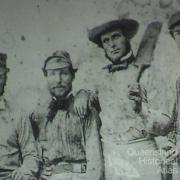 Tommy Wills (right) with cricketing colleagues, 1864