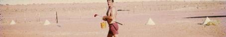 Pilot practising golf on the Birdsville airstrip, 1972