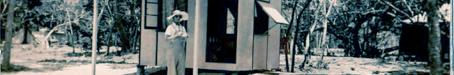 Elizabeth Coombs outside cabin on Hayman Island, 1938